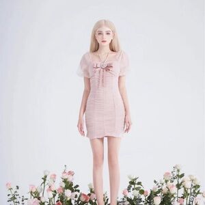 Chic Pink Mini Dress with Bow Detail